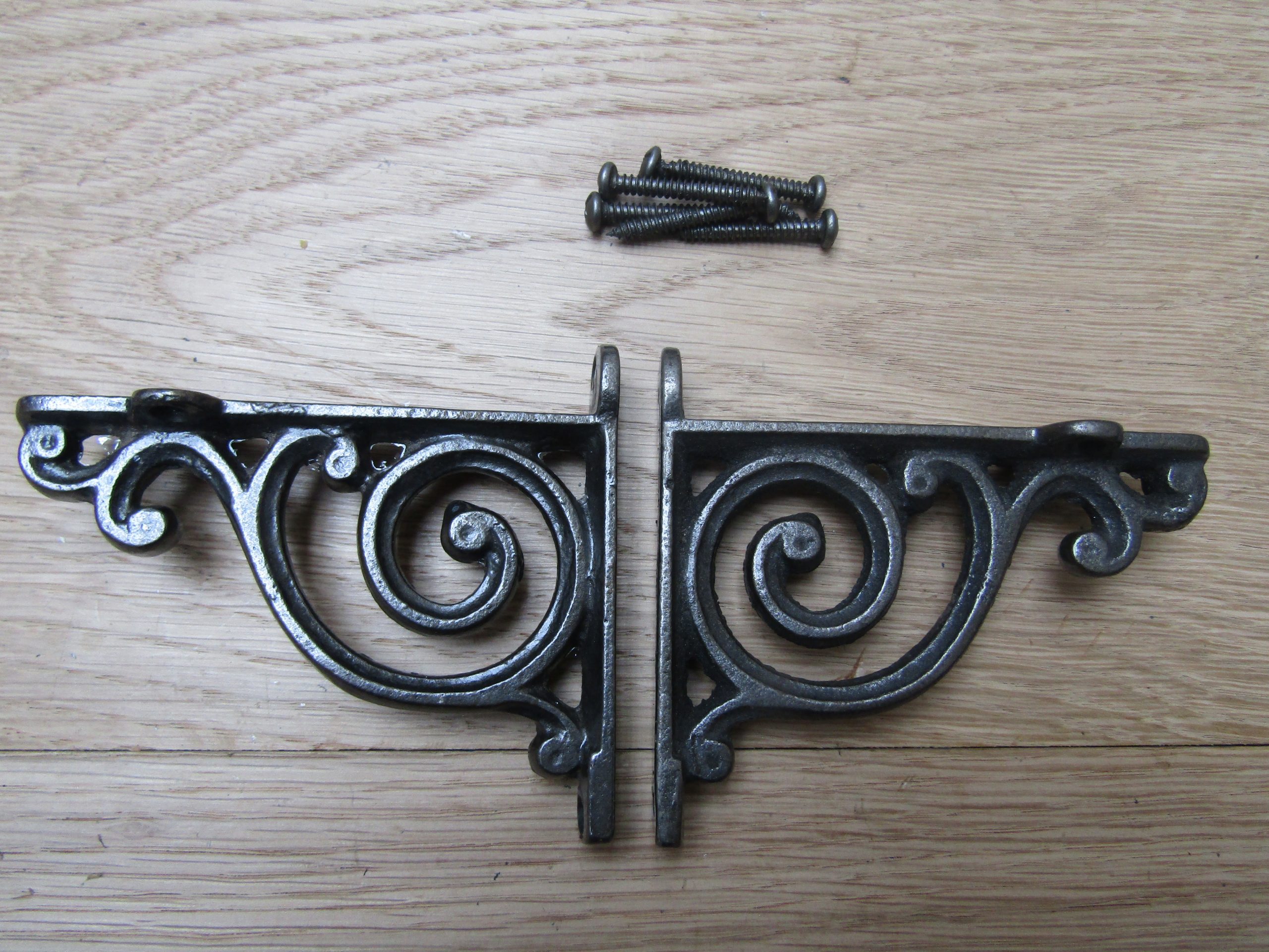 Pair Of Swirl Shelf Brackets Antique iron
