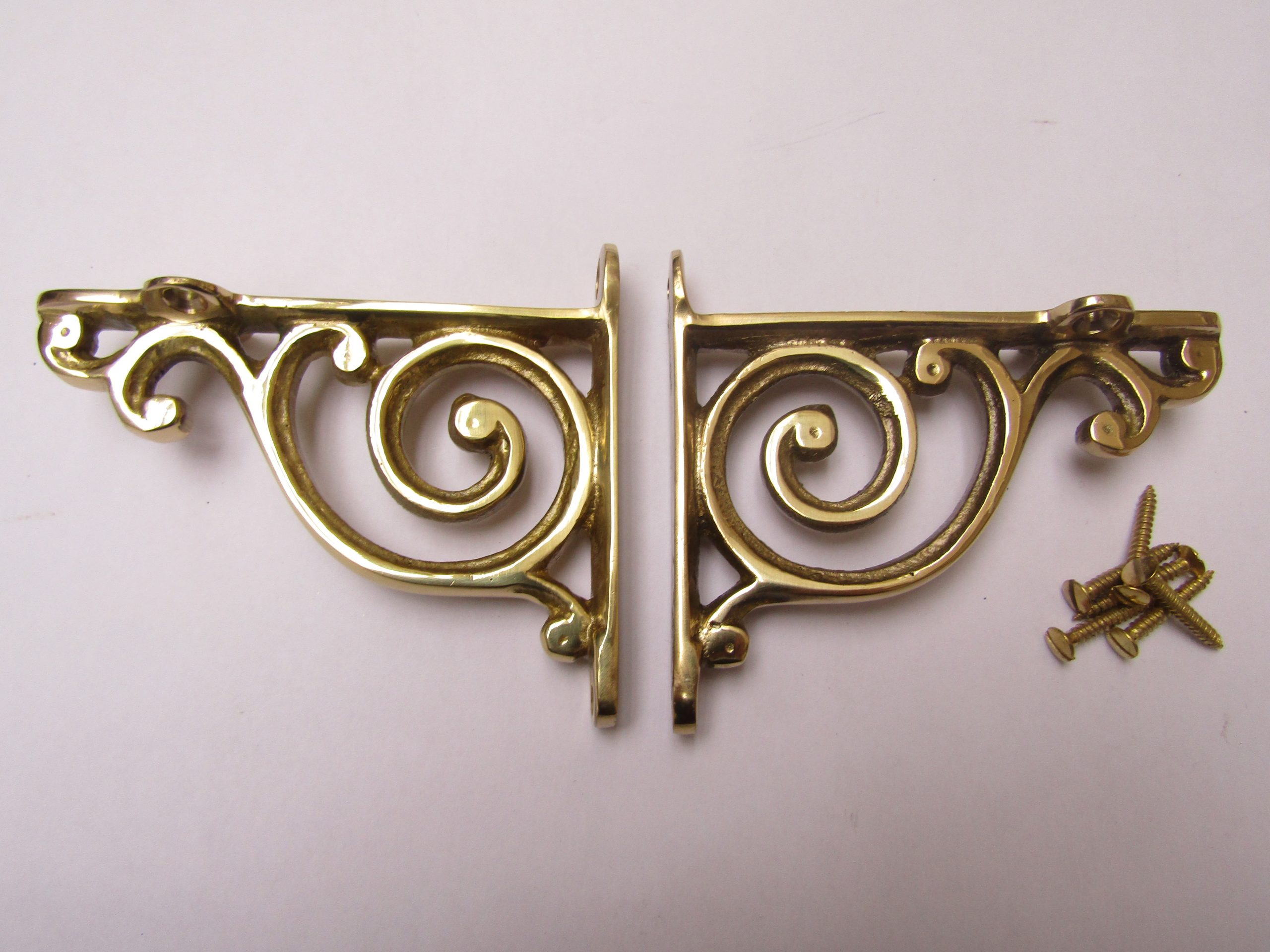 Pair Of Swirl Shelf Brackets Polished Brass