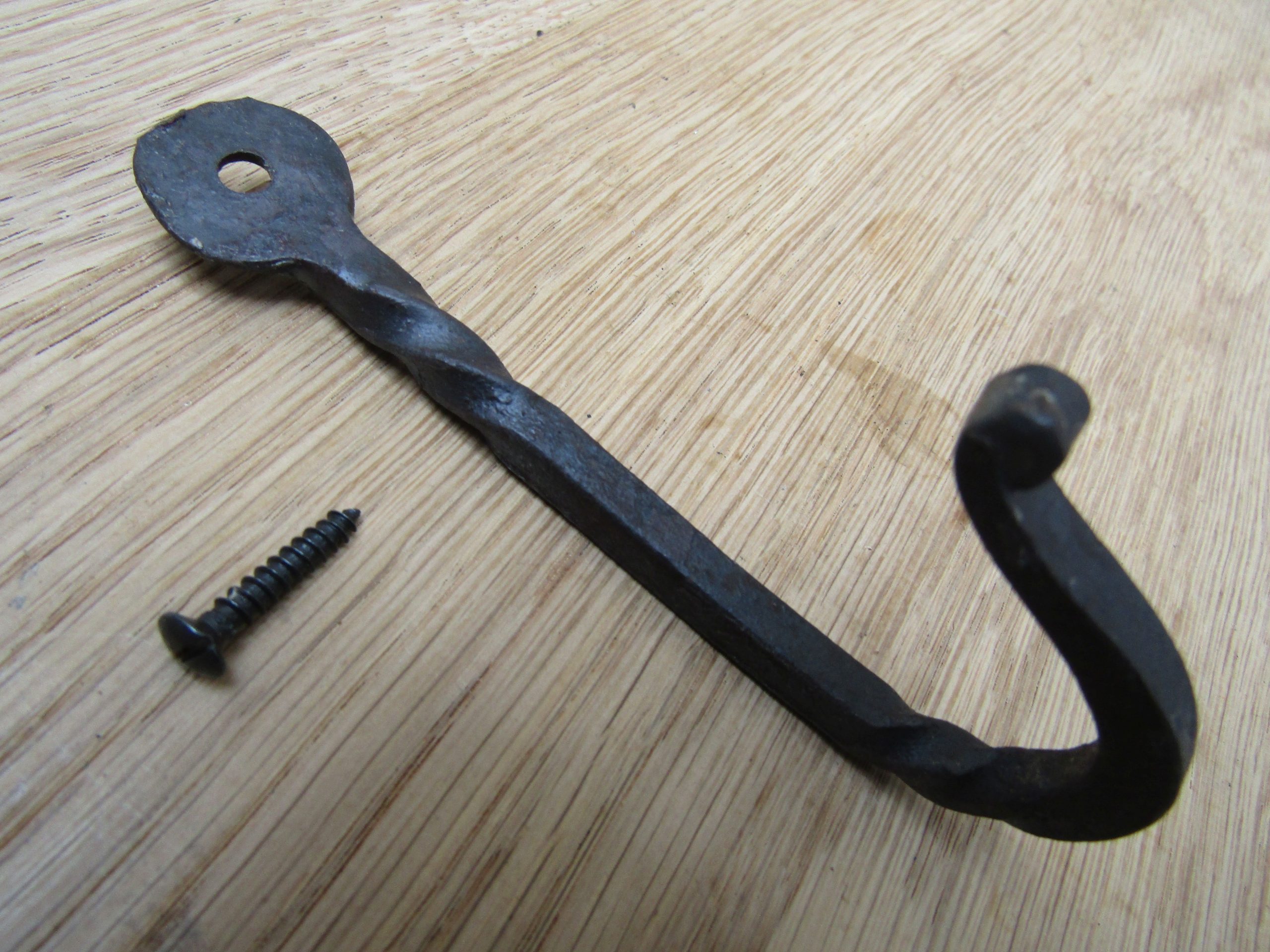 Hand Forged Penny End Twisted hook Black wax